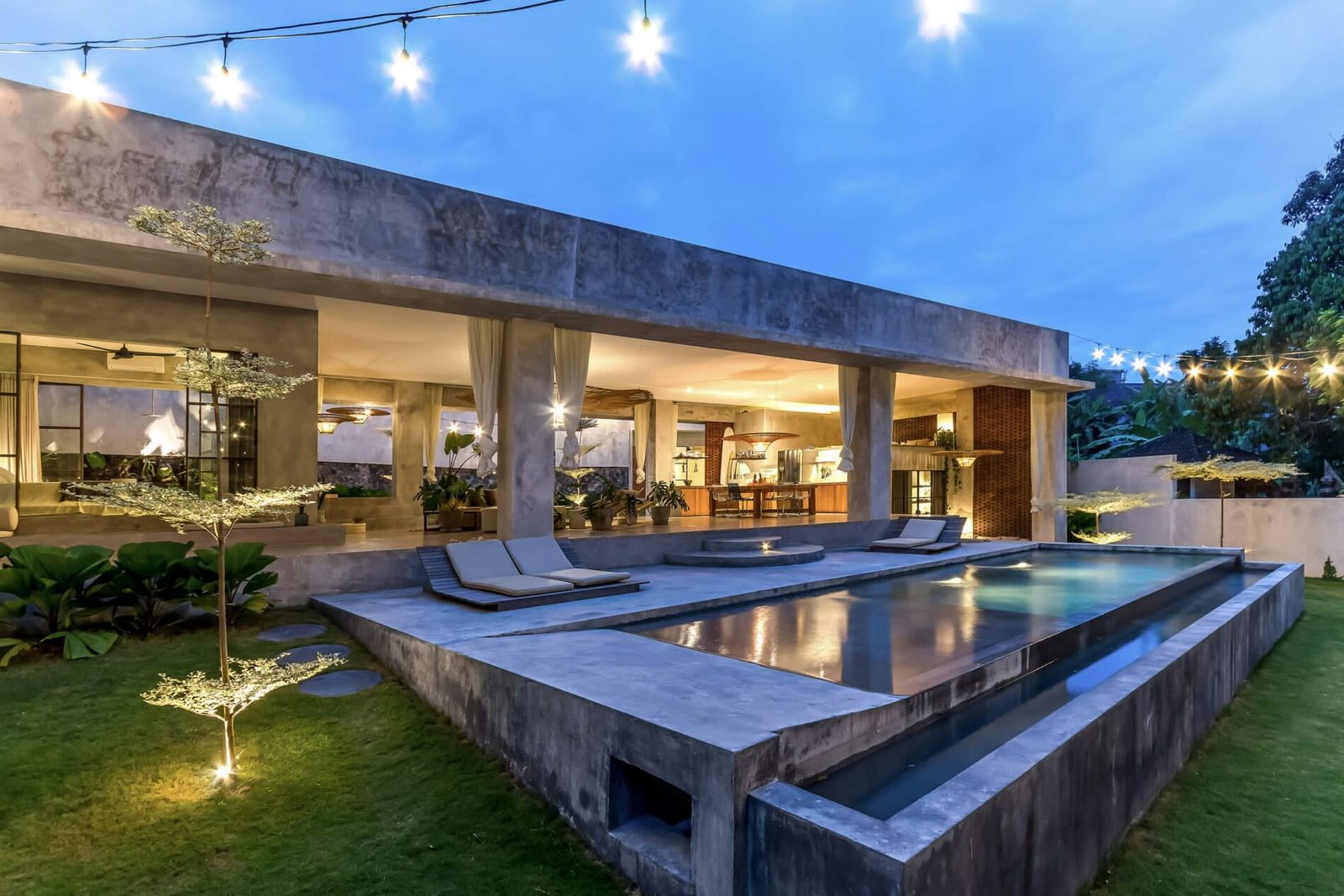Tropical Brutalist Riverside Villa in Pererenan